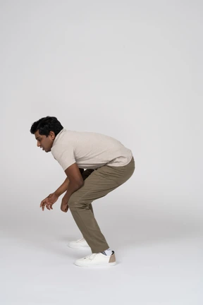 Man in casual clothes posing