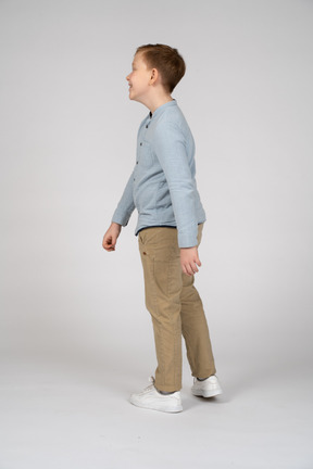 Side view of a boy walking
