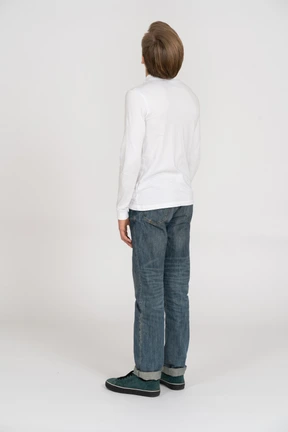Young man in casual clothes standing