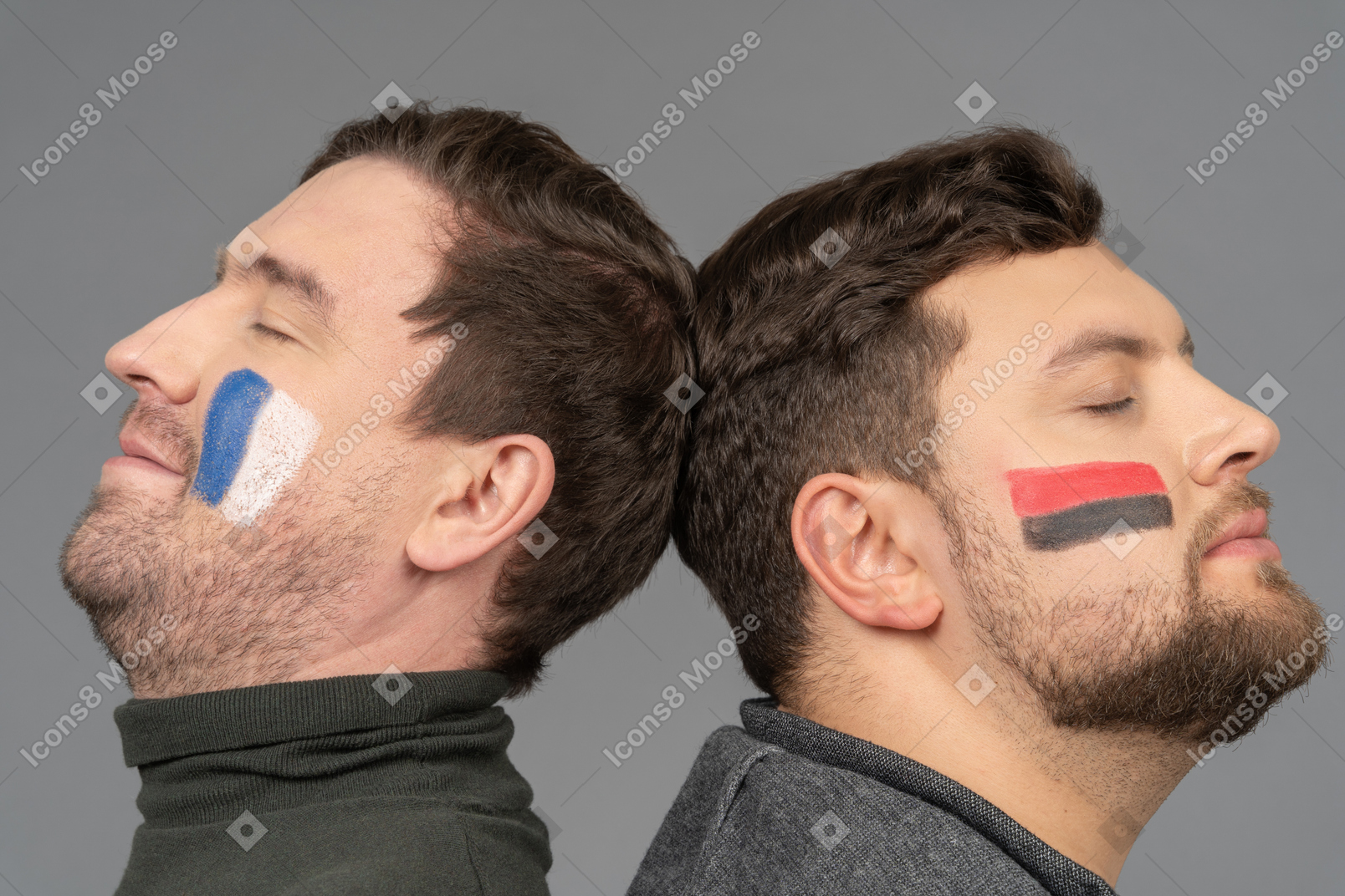 Portrait of two male football fans