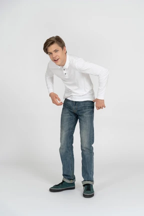 Young man in casual clothes standing