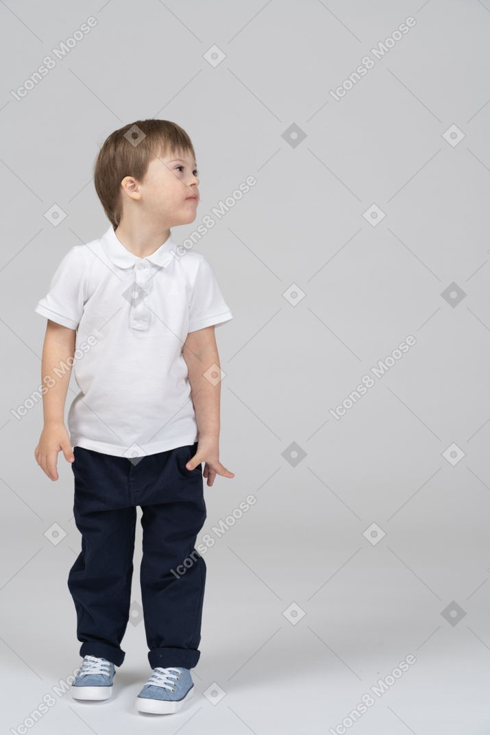 Front view of little boy looking right