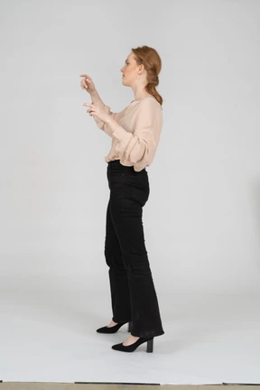Woman in beautiful blouse standing