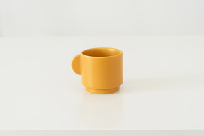 Yellow ceramic cup