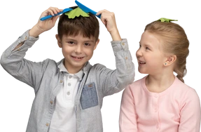 Little boy and girl playing with toys
