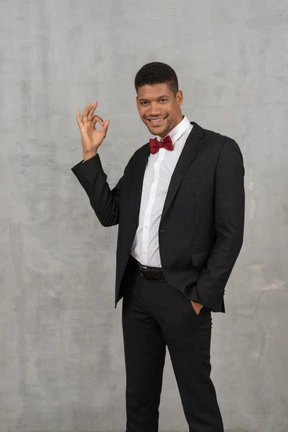 Man in black suit standing