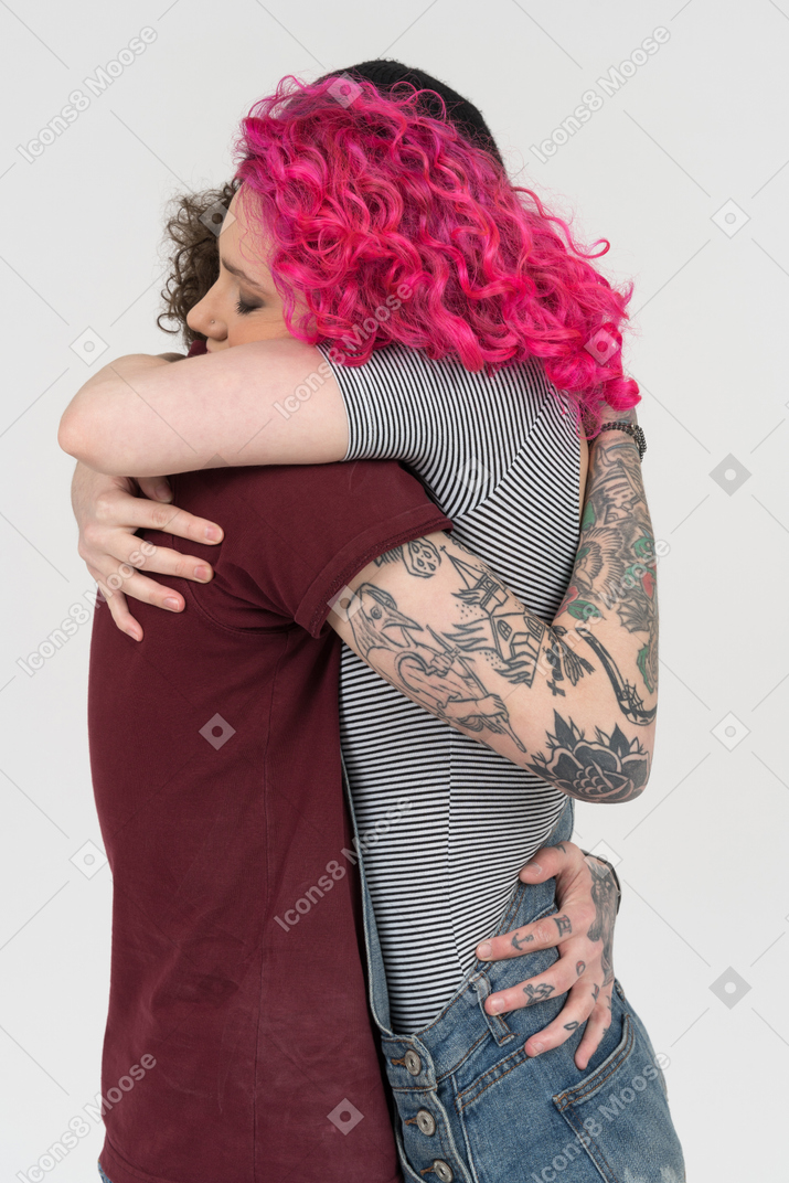 Side shot of hugging couple