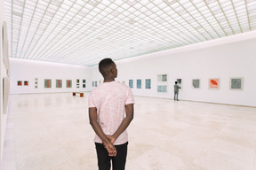 Man in art gallery