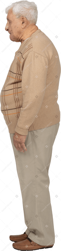 Side view of a sad old man in casual clothes