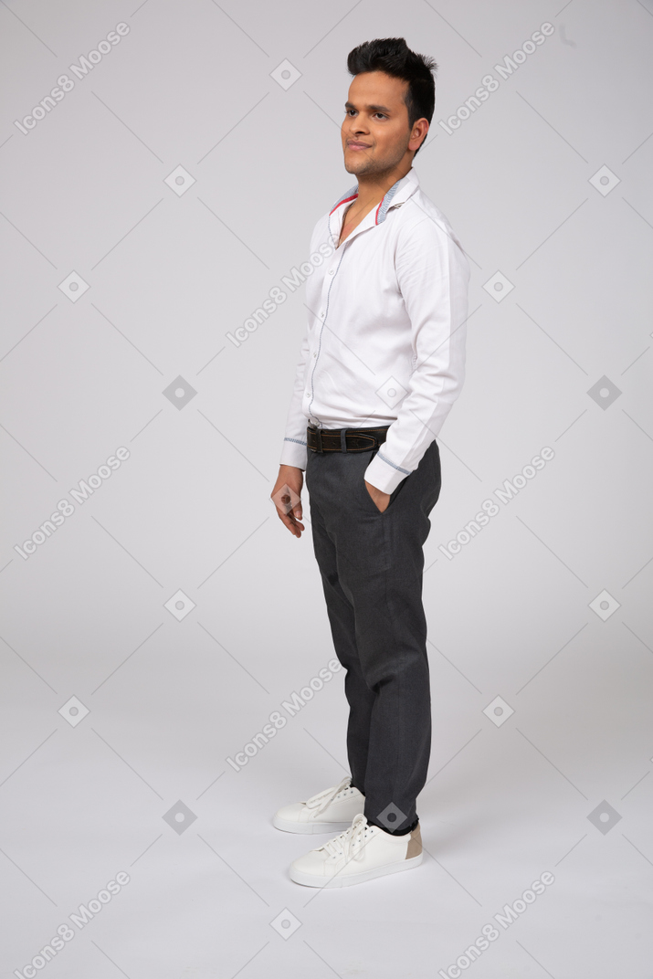 Man in white shirt standing