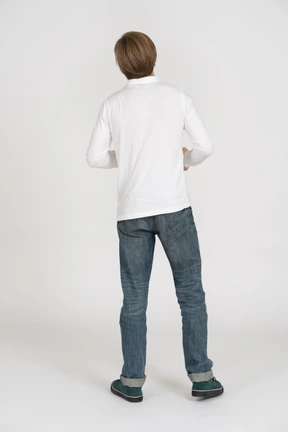 Young man in casual clothes standing