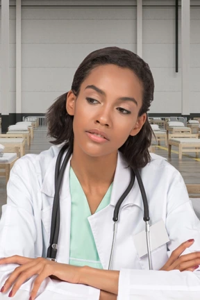 Woman doctor sitting and thinking