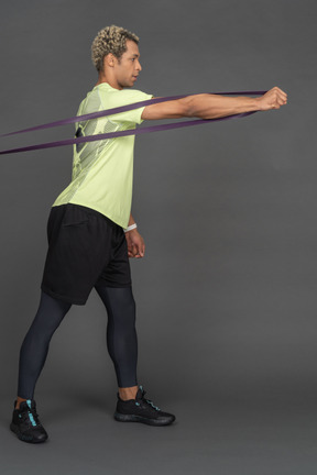 Man using resistance band for exercise