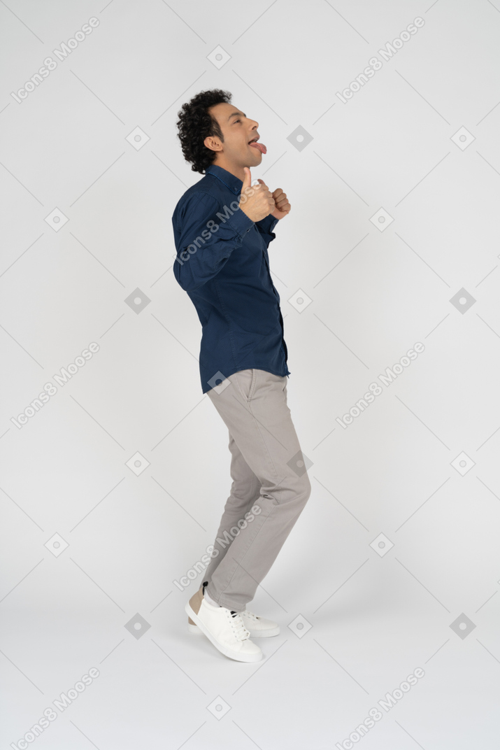Side view of a happy man gesturing