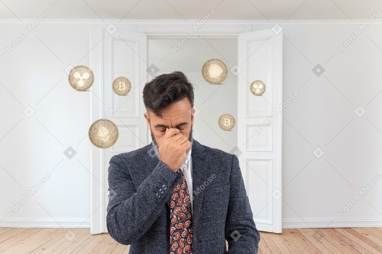 Frustrated man surrounded by coins