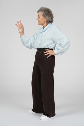 Old lady giving okay sign