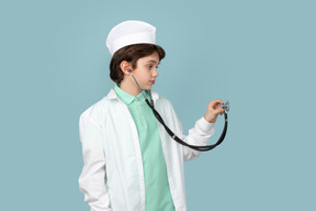 Attractive teenage in a doctor's outfit