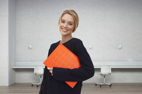 Woman holding a file folder