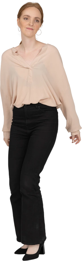 Woman in beautiful blouse standing