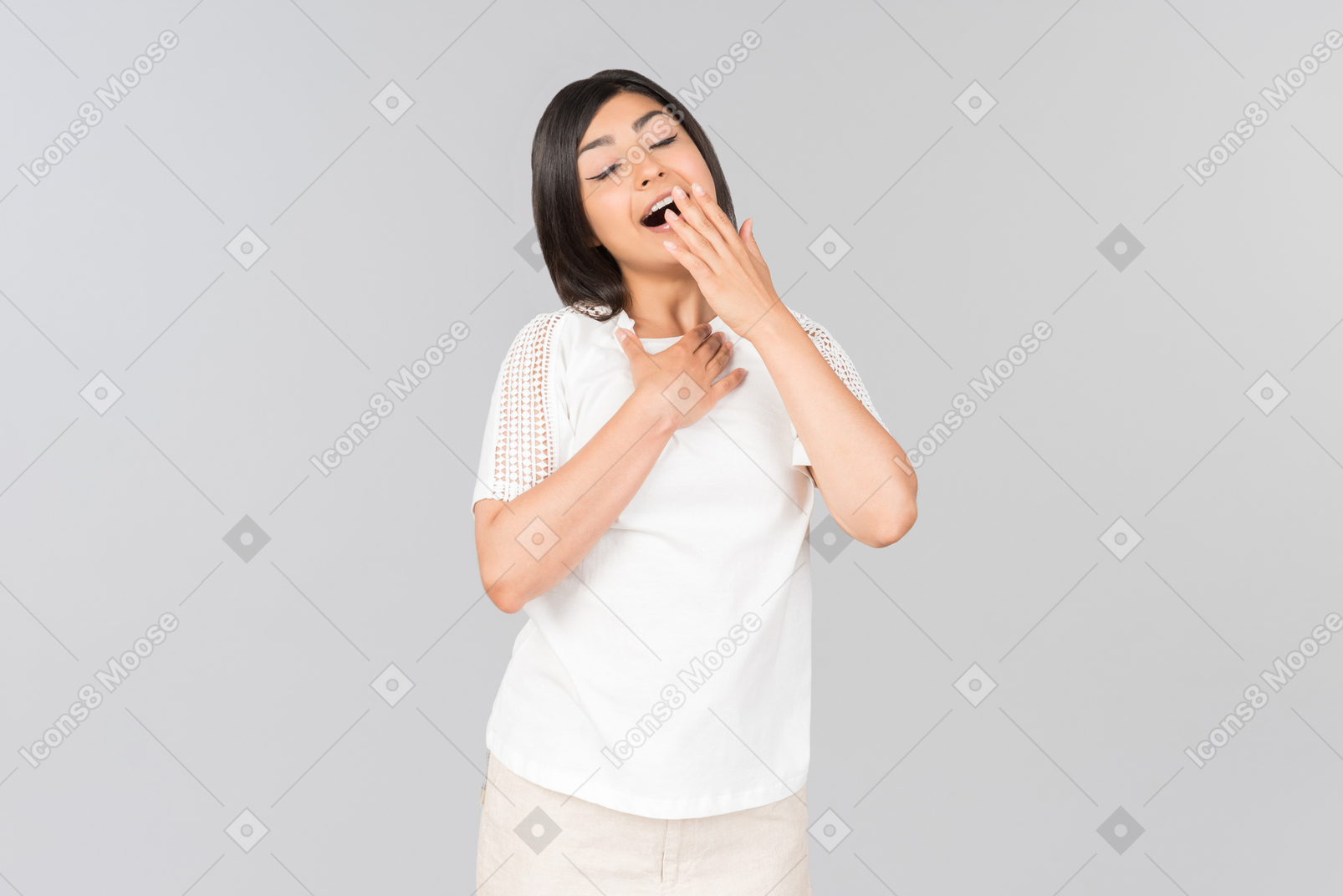 Young indian woman in comfy clothes yawning