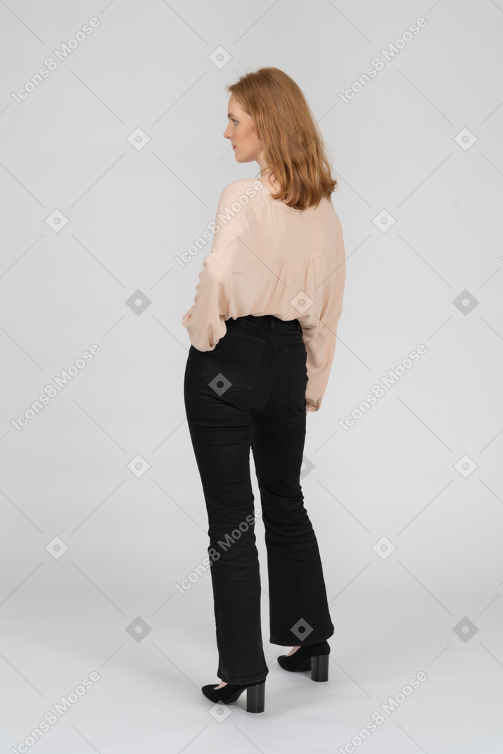 Woman in beautiful blouse standing