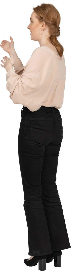 Woman in beautiful blouse standing