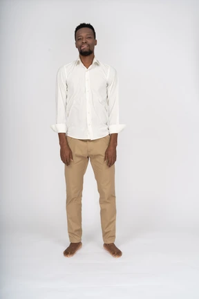 Man in white shirt standing