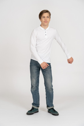 Young man in casual clothes standing