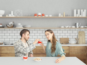 Handsome couple drinking tea