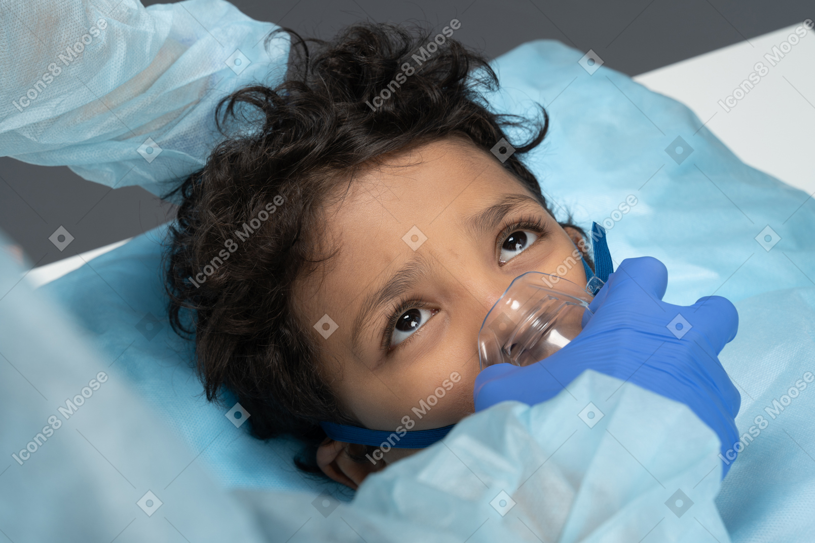 Kid in the oxygen mask