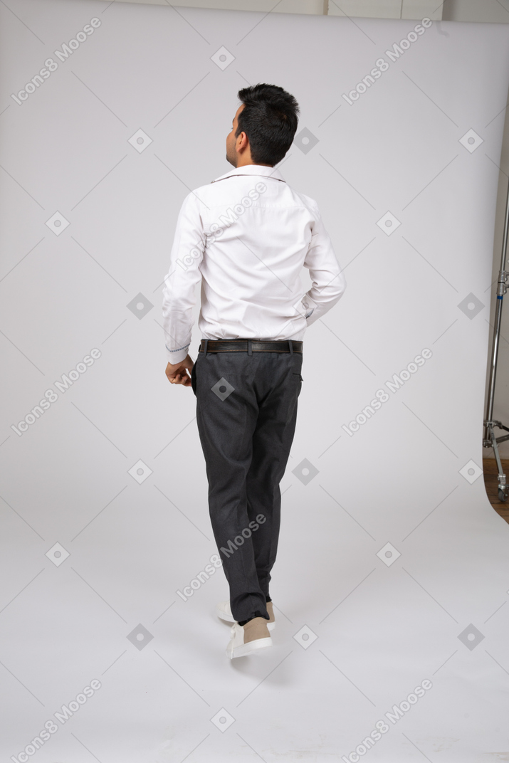 Man in white shirt standing