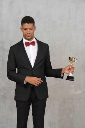 Man in suit declining an award