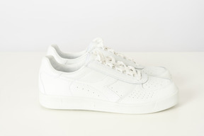 White sneakers on a white background