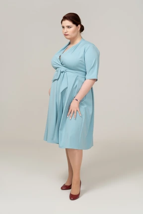 Front view of a woman in blue dress