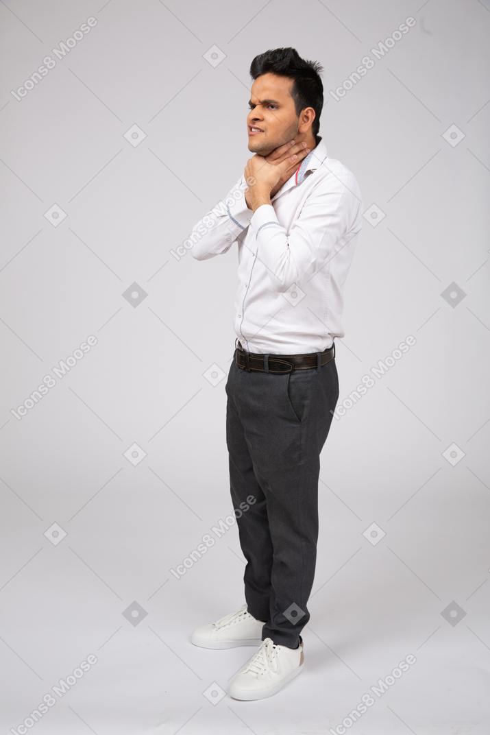 Man in white shirt standing