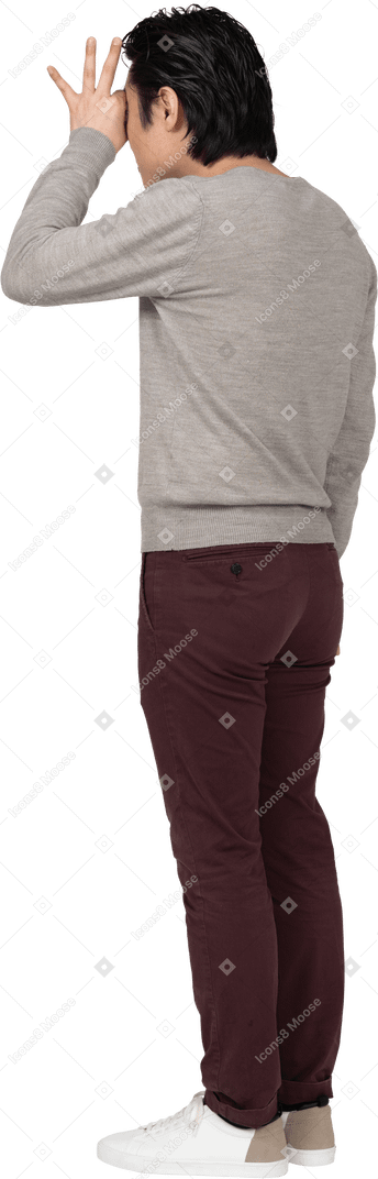 Man in casual clothes posing