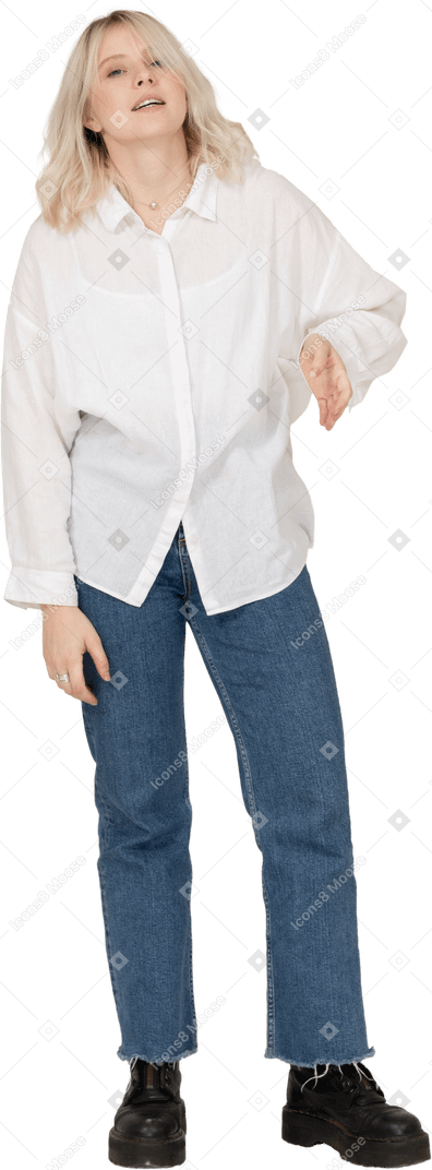 Front view of a blond female in casual clothes talking and gesticulating
