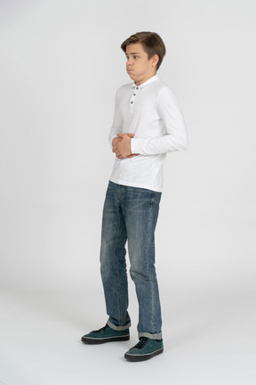 Young man in casual clothes standing