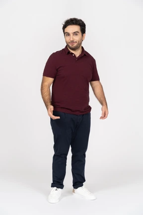 A smiling young man wearing casual clothes