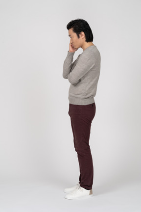 Man in casual clothes posing