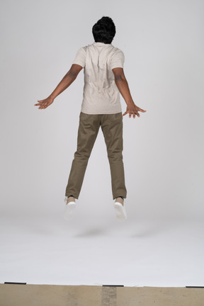 Man in casual clothes jumping