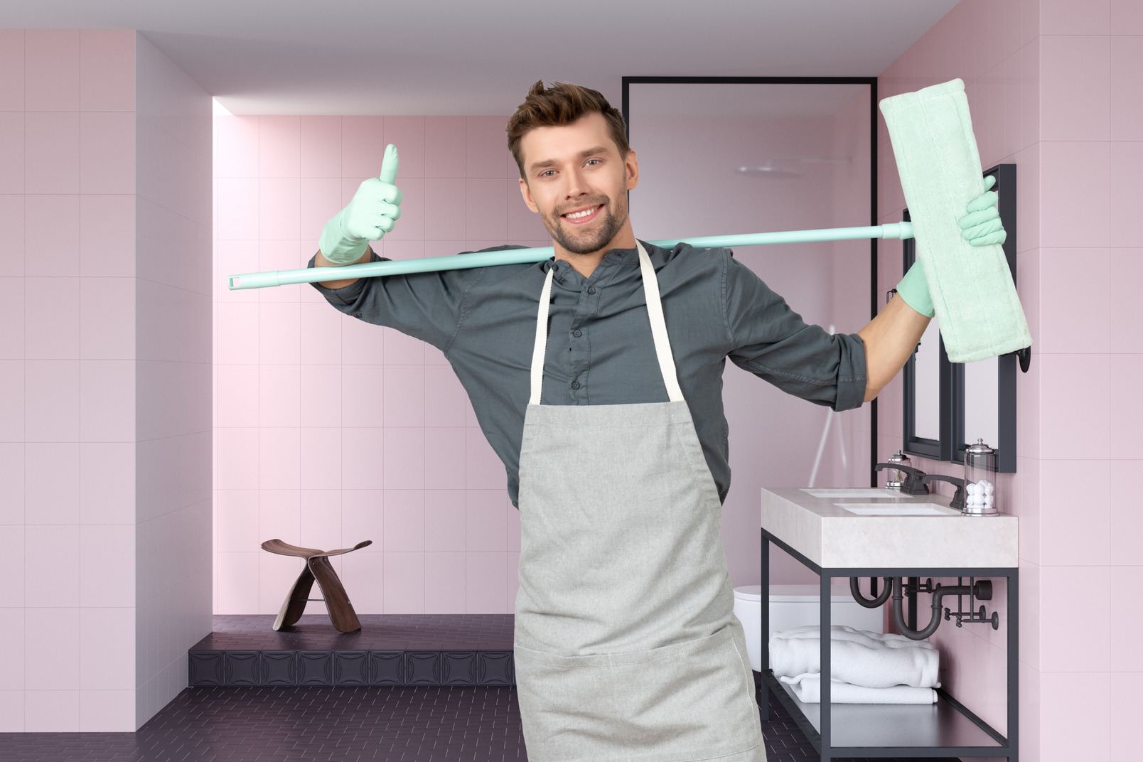 Man in apron cleaning the kitchen