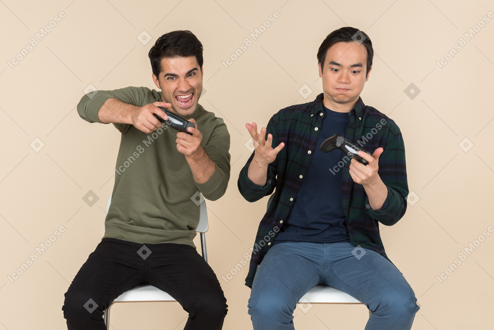 Interracial friends sitting in chairs and playing video game