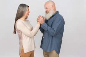 Elegant senior couple standing together