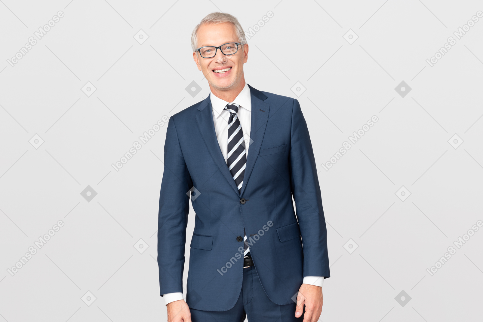 Smiling middle aged businessman standing with his handa aside