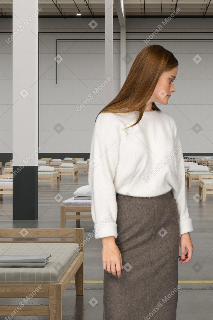 A woman standing on a hospital background