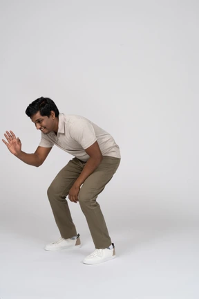 Man in casual clothes posing
