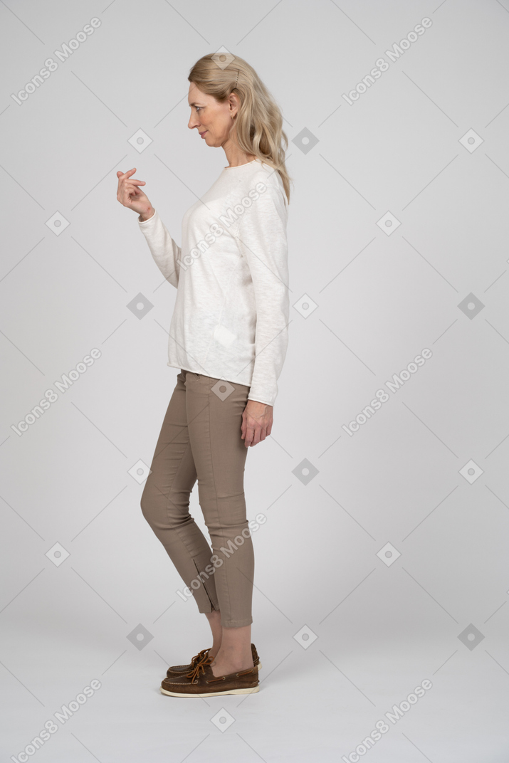 Woman in casual clothes standing