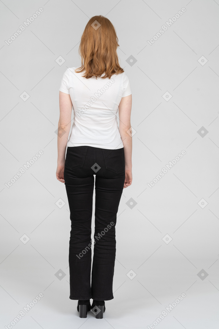 Back view of standing woman