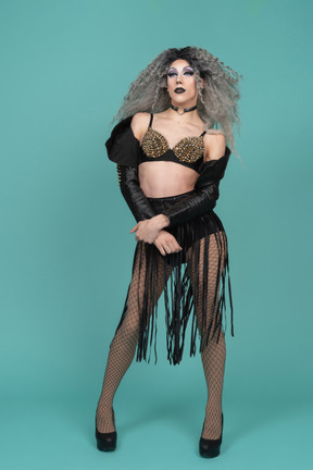 Drag queen posing with hands together